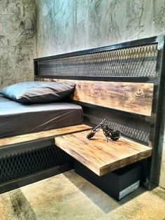 a bed that is made out of wood and metal