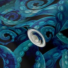 an abstract blue and black wallpaper with swirly circles on it's surface