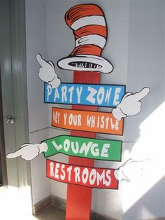 a cat in the hat themed party sign