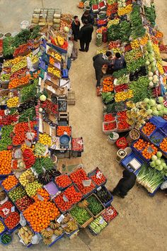 an aerial view of a market with fruits and vegetables