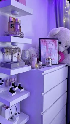 a room with purple walls and shelves filled with cosmetics, perfumes and other items