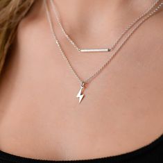 This layered silver lightning necklace is a set of 2. The chains are solid sterling silver 925. They have an extension so that the size can be adjusted. The one necklace has a lightning pendant on it. Lightning Necklace, Lightning Pendant, Lightning Bolt Necklace, Necklace Stack, Layered Necklace, Lightning Bolt, Necklace For Women, Silver 925, Jewelry Necklace Pendant