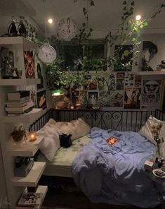 a bed room with a neatly made bed and lots of plants