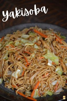 a plate full of noodles with carrots, onions and cabbage on it that says yakisoba