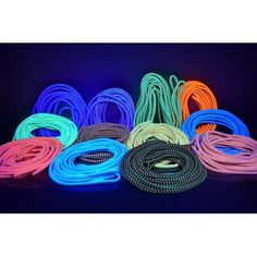 neon rope with various colors and sizes on a black background, all in the same color