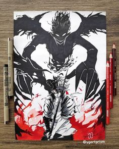 a drawing of an anime character with red and black ink on paper next to two crayons