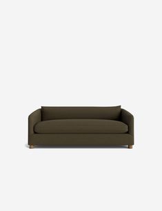 a dark brown couch against a white background