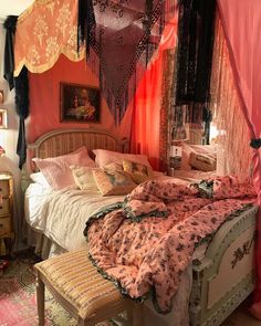 a bed room with a neatly made bed and pink walls