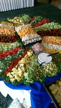 a large platter filled with lots of different types of food on top of a table