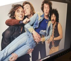 a computer screen with an image of the rolling stones on it