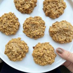 a white plate topped with cookies on top of a table