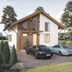 two cars parked in front of a house