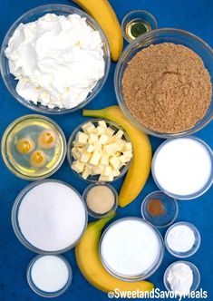 an assortment of ingredients are displayed on a blue surface