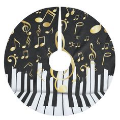 a black and white piano with gold musical notes on it's side, as well as the word royal elgartist music note key by cup of art