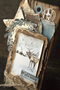 an altered picture frame with some deer on it