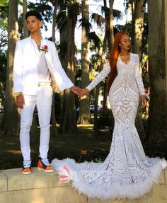 Glamorous white lace and feather mermaid long African American prom dress with V neckline, long sleeves, and long train. Prom Vibes, Feather Prom Dress, Wedding Dress Black, Prom Dress With Train, Dressed In White, Homecoming Queen, White Prom