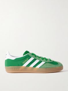 adidas Originals' 'Gazelle Indoor' sneakers were initially released in the '70s as an indoor sports shoe and have since grown to become an iconic streetwear staple. This iteration is made from green nylon with suede and leather trims and gummed rubber soles. Adidas X Gucci Gazelle Green, Retro Green Adidas Sneakers, Adidas Gazelle Green, Adidas Green Suede Sneakers, Adidas Gazelle Collegiate Green, Cinch Bag, Adidas Shoes Originals, Indoor Sports, Adidas Originals Women