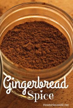 a jar filled with cinnamon spice sitting on top of a wooden table