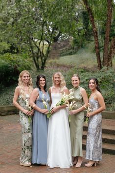 a group of women standing next to each other