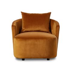 an orange chair with two pillows on it