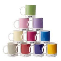 a stack of coffee mugs with different colors