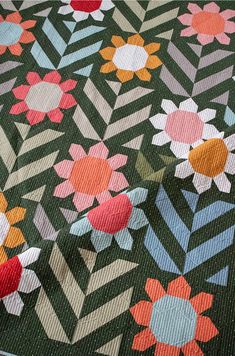 an image of a colorful flower pattern on fabric