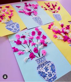 four cards with flowers in vases on top of each one and two are cut out from paper