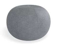 a large gray ball sitting on top of a white floor