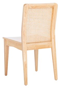 Give your décor a touch of coastal flair with this breezy Benicio Dining Chair. Refreshing a familiar silhouette with a rich natural finish and matching natural rattan back, Benicio ensures hours of comfortable, stylish dining. Sold in sets of two. Safavieh Benicio Coastal Dining Side Chair (Wood Frame) in Brown | DCH1005D-SET2 Coastal Dining Chairs, Coastal Dining, Rattan Dining, Chair Wood, Rattan Dining Chairs, Side Chairs Dining, Rubber Wood, Wood Color, Wood Chair