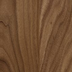 closeup of wood grain on the surface of a piece of furniture that has been made to look like something out of wood