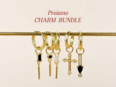 Charm earrings Bundle with 5 gold plated Italian Charms made from 925 sterling silver & Cubic Zirconia SAVE UP TO 30% WITH OUR CHARM BUNDLES Discover our elegant "Praiano" charm bundle. This thoughtfully curated collection shines with its timeless Cubic Zirconia mix, making it a perfect complement to your everyday outfits. Our Mix and Match earring charms are made of 925 sterling silver coated with a long-lasting micron gold layer decorated with Cubic Zirconia crystals. Charm Material: 925 Sterl Earring Charm, Italian Charms, Hoop Charms, Earring Bundle, Earring Charms, Silver Coat, Charm Set, Jewelry Earrings Hoops, Charm Earrings