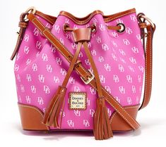 Dooney & Bourke's signature monogram makes this drawstring crossbody instantly recognizable. Interior zip and slip pockets make it fully functional -- a bag-lover's dream come true. From Dooney & Bourke. Preppy Things, Adaptive Clothing, Pendant Watches, Italian Jewelry, Luggage Sets, Dooney Bourke Handbags, Dooney & Bourke Bags, Ankle Bracelets, Dream Come True