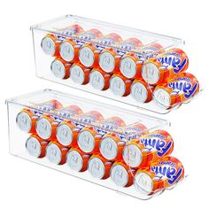 two clear boxes filled with orange and white sodas next to each other on a white background