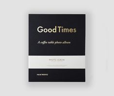 a book with the title good times written in gold and black, on a white background