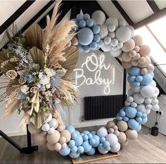 a baby shower decoration made out of balloons