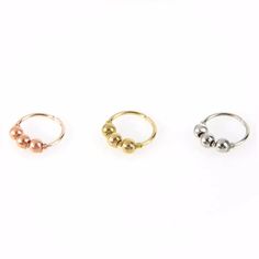 three different types of rings on a white background