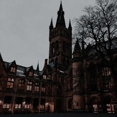 an old building with many windows at night