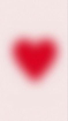 a red heart shaped object on a white background