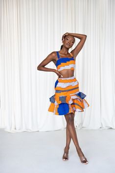 Fitted Multicolor Ruffled Mini Skirt, Fitted Multicolor Sets With Tiered Skirt, Fitted Orange Skirt, Fitted Multicolor Tiered Mini Skirt, Fitted Orange Skort, Fitted Orange Mini Skirt, Orange Fitted Mini Skirt, Fitted Multicolor Tiered Skirt, Fitted Orange Cotton Skirt