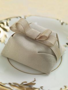 a white plate topped with a small purse