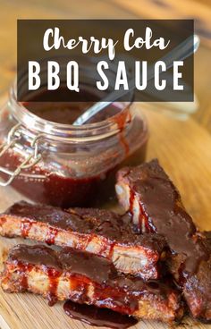 bbq sauce and ribs on a cutting board with the words cherry cola bbq sauce