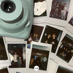 an old camera is surrounded by polaroid pictures