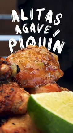 there are some chicken wings and a lime on the table with words above it that says, atlas agaven ploinn