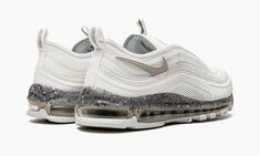 The Nike Air Max 97 Terrascape “White/Light Iron Ore” is a neutral colorway of the retro performance running shoe that debuted back in 1997.  The Air Max 97 Terrascape features a similar appearance to the standard AM97, save for a few modifications, including materials made from sustainably sourced materials.  The shoe’s upper is made from white mesh and features tonal and translucent wavy leather overlays, similar to the Air Max 97.  The reinforced mudguard is constructed from recycled material Iron Ore, White Mesh, Nike Air Max 97, Air Max Sneakers, White Light, Air Max, Nike Air Max, Running Shoes, Sneakers Nike