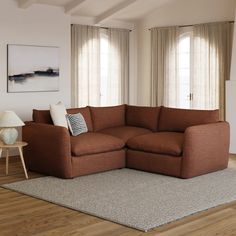 a living room with a large sectional couch