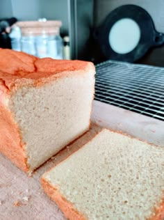 a loaf of bread sitting on top of a cutting board