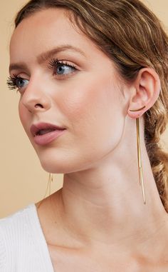 Add an elegant touch to your outfit with these Fashion Vintage Glossy Arc Geometric Long Thread Tassel Drop Earrings for Women. Made with Copper as the base metal, they boast a timeless design that will never go out of style. Elevate your look with these statement earrings. Hypoallergenic: Perfect for sensitive skin, ensuring maximum comfort. Tarnish Free: Long-lasting shine and beauty, resistant to everyday wear and tear. Alloy Free: Made without harmful alloys, ensuring quality and durability. Chic Metal Ear Cuff, Elegant Gold Metal Ear Climbers, Elegant Metal Ear Cuff For Formal Occasions, Elegant Metal Ear Cuff For Formal Events, Elegant Metal Single Ear Cuff, Elegant Metal Ear Cuff For Party, Trendy Metal Ear Cuff With Matching Earrings, Gold Metal Ear Climbers, Elegant Metal Ear Cuff For Evening