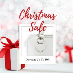 a white purse with red ribbon and christmas sale tag on it next to a gift box