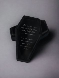 an empty black box with writing on it