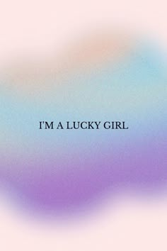 the words i'm a lucky girl on a blurry blue and purple background